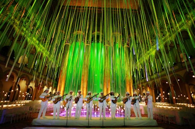 A nine-piece mariachi band dressed in white outfits took to the dance floor as guests found their seats for dinner.