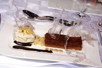 The evening's dessert course, dubbed 'Le Kit Kat,' featured a hazelnut creme dessert bar and ice cream with sugar sculptures on top.