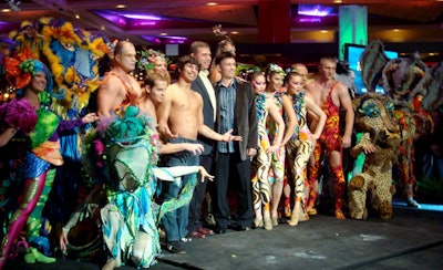 Neil Goldberg, creator and director of Cirque Productions, posed for pictures with the cast.