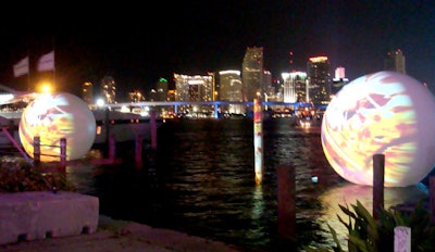 Fifteen-foot spheres anchored in the bay were projected with renderings of the hotel and other colorful visuals after nightfall.