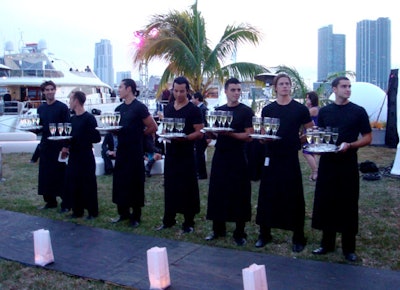 Waiters served champagne to guests as they arrived.