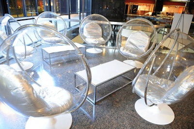 The pre-party cocktail reception took on a futuristic, mad scientist look that included clear bucket chairs.
