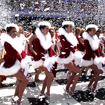 At the Rockettes' Christmas in August event in front of Radio City Music Hall to kick off ticket sales for their Christmas Spectacular, Zenith Pyrotechnics set off a shower of white confetti to look like snow.