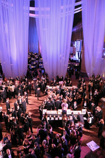 A sheer curtain separated the cocktail reception from the dinner area.