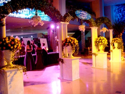Trellises covered in greenery and flowers set the Venice-inspired scene as guests entered the convention center.