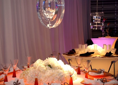 Ice chandeliers hung above the tables.