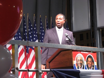 Thousands filled the public plaza outside Harlem's State Office Building, cheering as entertainers rallied the crowd from a stage.