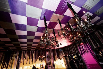 Van Wyck & Van Wyck fashioned a drop ceiling of interwoven bands of fabric at the Whitney Museum of American Art's Art Party in New York.