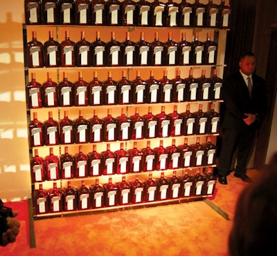 For a party celebrating the launch of a new cocktail by French liqueur company Cointreau in New York, planners created a backdrop of the brand's bottles to replace the typical step-and-repeat in the arrival area.