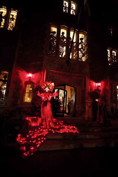 The Washington National Opera's Opera Ball used illuminated costumes for performers, including a countertenor who donned a garment plugged into an outlet at the entrance of the French ambassador's residence.