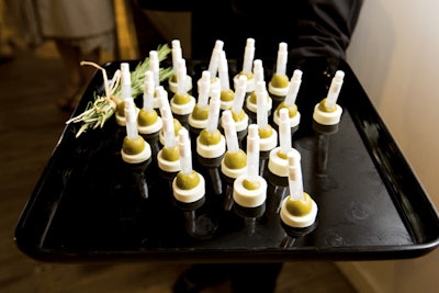 Cocktail Hour, With a TwistFor Chicago's Wonka Ball, a fund-raiser for the About Face Theatre, Calihan Catering served deconstructed martinis comprised of an olive resting atop a piece of blue cheese and stuffed with a mini spray-bottle of vodka.