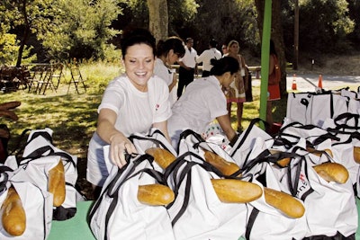 A Picnic to Pick UpInstead of queueing up for lunch, guests at sneaker brand Superga Italia's outdoor boccie festival in Los Angeles got branded tote bags filled with a picnic spread of a baguette, olive tapenade, brie, salads, and cookies.