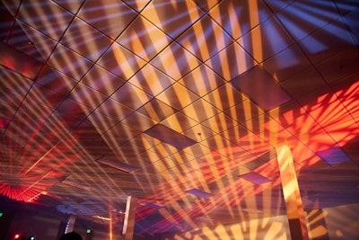 Colorful light patterns decorated the ceiling at the launch party.