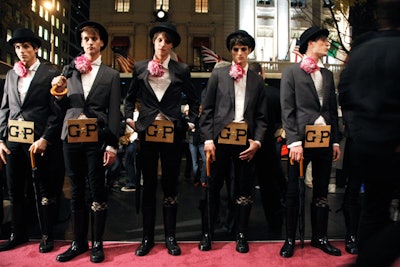 To play off Juicy Couture's Dirty English collection of cologne and beauty products for men, a row of male models in top hats stood at the entrance.