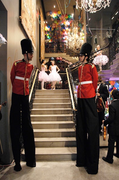 Inside the store, stilt walkers dressed as English foot guards welcomed guests.