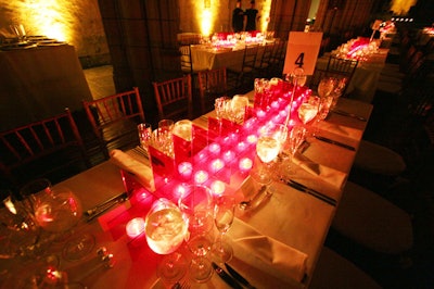 Jeff Leatham provided ambient light at each table, with candles placed in interlocking grids of red Plexiglas.