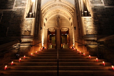 Jeff Leatham lined the entrance to the Church of the Intercession with candles to signal guests to cross Broadway.