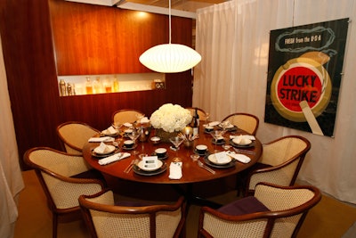Eastlake Studio's table for Geiger International evoked Mad Men with martini glasses and ashtrays at each place setting.