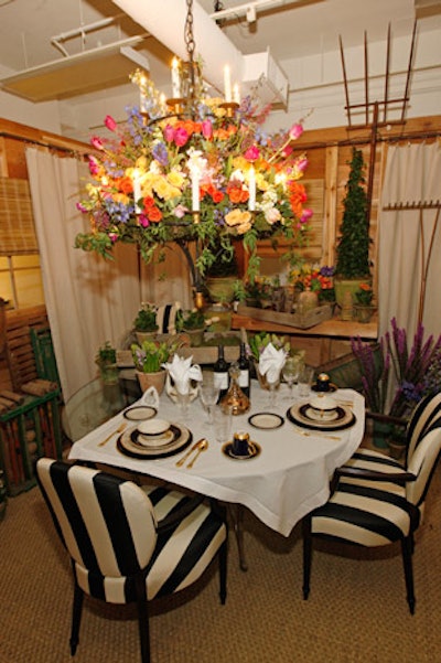 Diffa events consultant Peggy Bellar said that jewel tones—such as those displayed in the hanging flower arrangement at Dessin Fournir's table—feature prominently in tabletop trends this season.