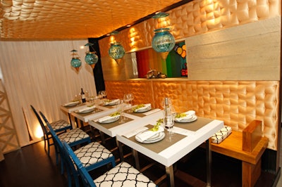 Tufted gold walls and a matching ceiling gave a jewel-box look to the environment Interior Space International created for OEC Business Interiors.
