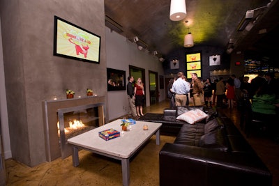 Flat-screen TVs showed logo imagery and audition outtakes from the show.
