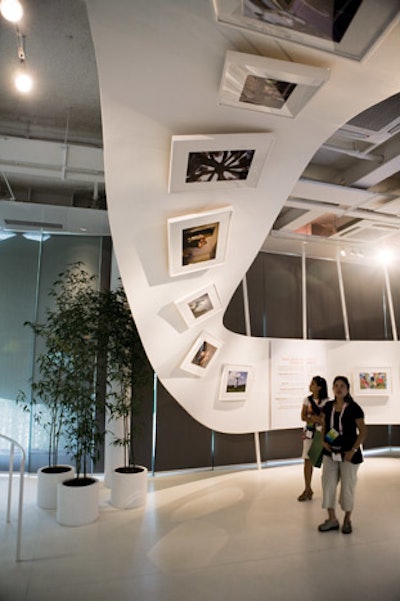 Photographs in the 'Global Challenges' exhibition of Johnson & Johnson's pavilion depicted the company's role in aiding international health crises.