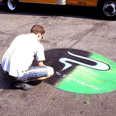 Massivemedia's chalk artists drew the new Powerade brand logo at strategically located points on the 17th Street pavement.