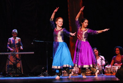 Dancers dressed in traditional Indian saris performed at the benefit.