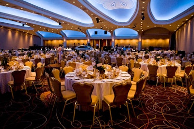 To go along with the event's eco theme, the planner used cream-colored table linens.