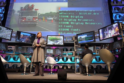 A theater-like set up inside the exhibition hall showcased new technologies in an environment designed to simulate a futuristic traffic management center.