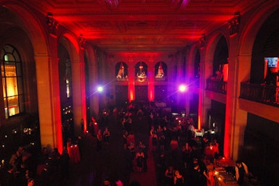 Organizers washed the main event space in red lighting for the Rouge gala.
