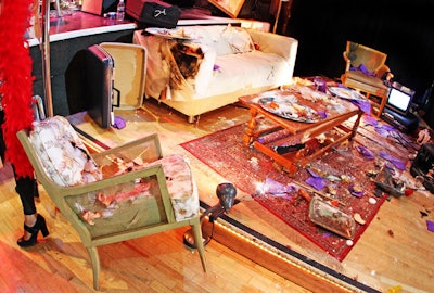 Part of the atmosphere for Collaboraction's Beggars' Banquet fund-raiser in Chicago last October included a trashed hotel room installationďż˝”complete with ripped-up sofas and old pizza boxes.