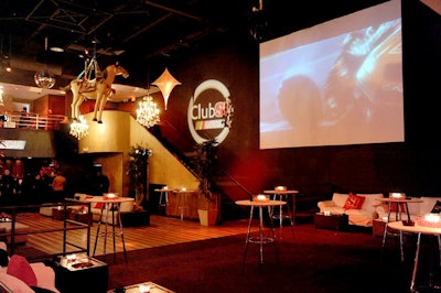 The production team left most of the venue's decor as it was, adding branding with gobos and lounge pillows.