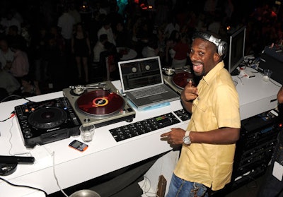 DJ Irie added the night's soundtrack from his perch on the second level.