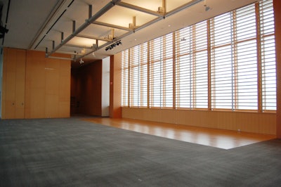 The glass wall on the south side of Baillie Court offers views of the historic Grange House and Grange Park.