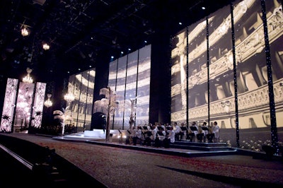 PRG Lighting projected iconic images-such as the Art Deco hotels on South Beach and 1950s images of the hotel-onto immense LED screens on three sides of the stage.