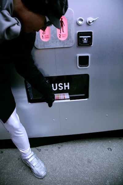 Guests collected their new clothes from the mouth of the vending machine after the brief song and dance.