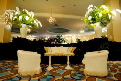 Monn used grass-lined lounge seating for the cabaret-style set up in the Fleur de Lis ballroom.