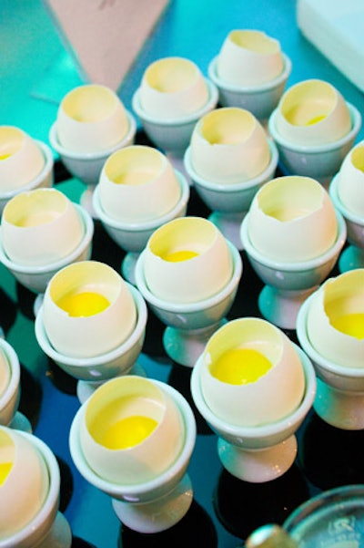 Egg shells filled with cauliflower puree and yolk-colored saffron chicken consomme gelee rounded out the science-themed menu at the 'Science in American Life' buffet.