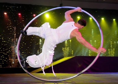Two sire wheel gymnasts performed during the opening act at dinner.