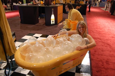 A model in a yellow bathtub filled with plastic bubbles promoted Yellow Tail Wine's line of sparkling wines.