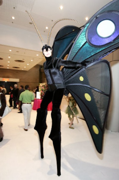 Acrobak's talent entertained the crowd with a 13-foot-tall 'butterfly' that roamed the show floor.