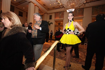 Several staffers dressed as taxi cabs ushered guests into the lobby of the Waldorf-Astoria and escorted them to the dining room and cocktail areas.