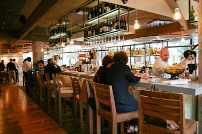 The restaurant's bar surfaces are made from recycled concrete.