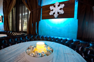 Snowflake decor pieces decked the walls, and ornaments served as table centerpieces.