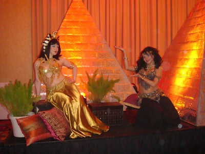 In the Egypt space, golden pyramids and models dressed as Cleopatra provided a photo op for attendees.