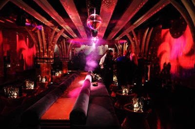 Fake elephant tusks wrap the columns inside Cain Luxe, contrasting the sleek floors and modern furnishings.