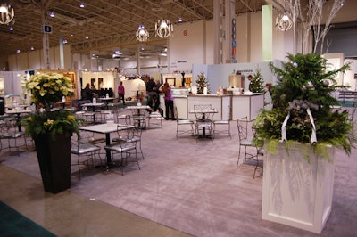 Arrangements featuring greenery and poinsettias lined a café called the One of a Kind Piazza.
