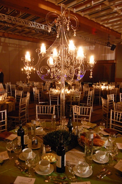 Barbara Hershenhorn topped tables with three different centrepieces, including tall Plexiglas candelabras.