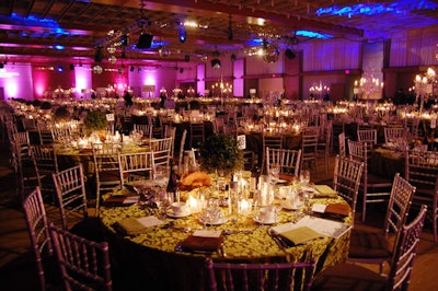 Party Barbara Co. topped tables with damask linens and used pink lighting to illuminate the walls in the M.T.C.C.'s Constitution Hall.
